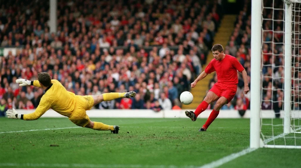 Football striker taking a shot on goal during a Premier League match